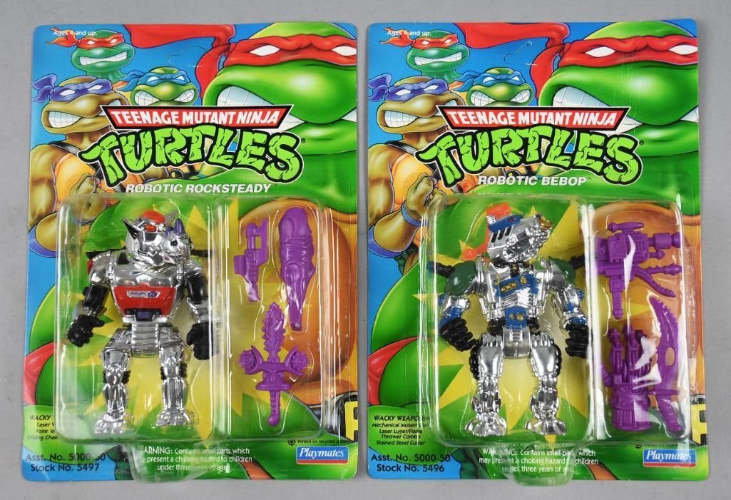 (2) 1993 TMNT Robotic Rocksteady/Bebop-Unpunched--MOC-NOS: Lot is two 1993 Playmates Teenage Mutant Ninja Turtles Robotic Rocksteady/Bebop-Unpunched-NOS. Single owner collection from the largest toy collector on the West Coast.