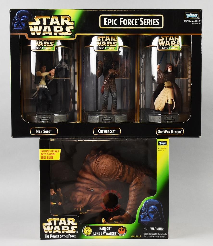 (2) 1998 Kenner Star Wars Action Figure Sets-MIB-NOS: Lot is two 1998 Kenner Star Wars Action Figure Sets-MIB-NOS. Includes Epic Force Series with Luke, Han and Chewbacca set and a Luke and Rancor set. Single owner collection from the largest toy collect