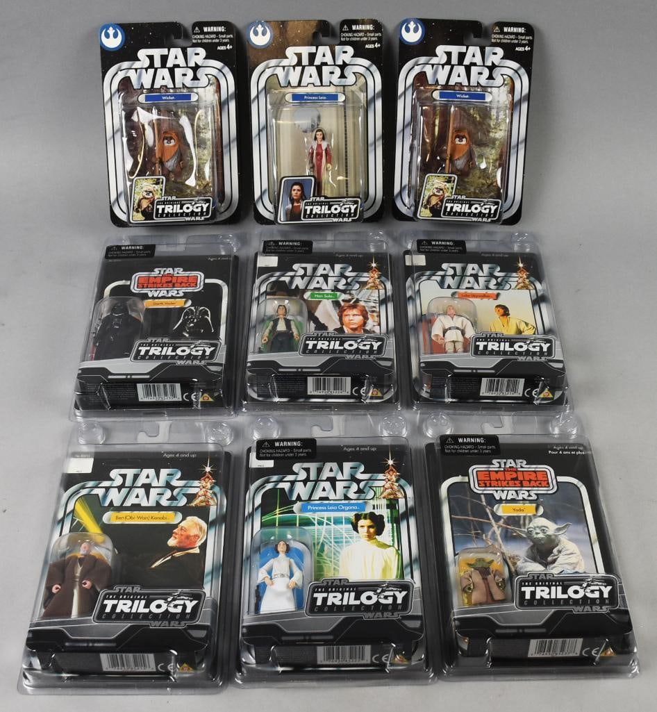 (9) 2004 Hasbro Star Wars Trilogy Action Figures-MOC-NOS: Lot is nine 2004 Hasbro Star Wars Trilogy Action Figures-MOC-NOS. Includes Han Solo, Darth Vader, Luke Skywalker, Obi Wan Kenobi, Yoda, two Princess Leia (variant) and two Wicket, Single owner collect