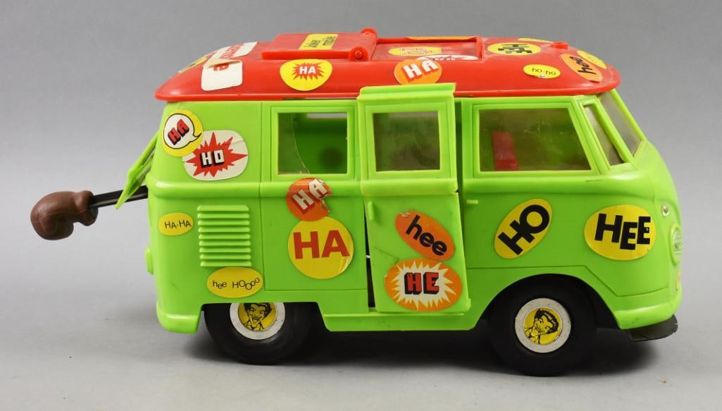 1975 Mego Jokermobile w/ Trapdoor Boxing Glove: This fun piece is from 1975, Mego toys and is a VW bus Jokermobile. It is hard plastic with all original decals. Side door slides open on one side, back trapdoor with boxing glove. Single owner collec