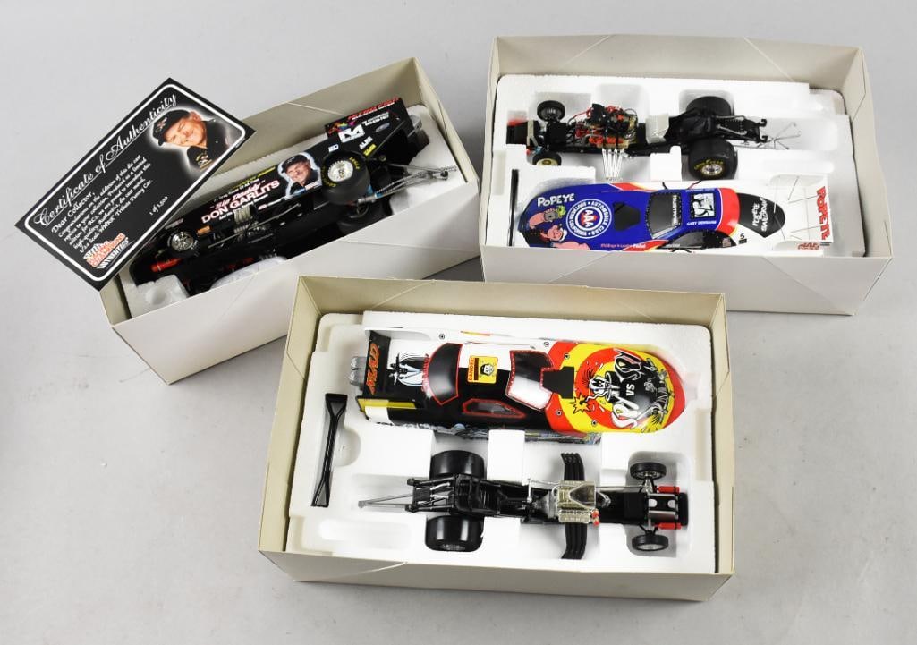 (3) 1998, 2004-05 RC2/Action Die Cast Racing Cars-MIB-NOS: Lot is three 1998, 2004-05 RC2/Action Die Cast Racing Cars-MIB-NOS. Includes Mad Racing Spy vs. Spy, Popeye and Frank Pedegran Salutes Big Daddy. Single owner collection inspired by the 1969 Moon Land