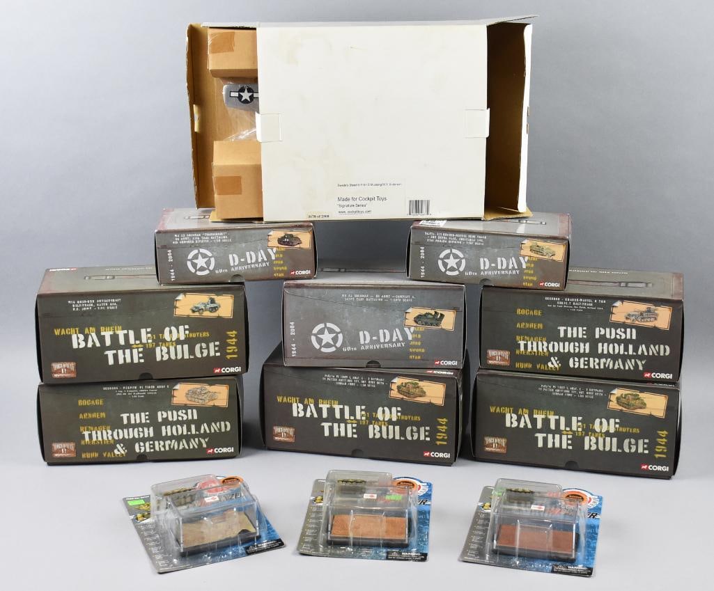 (12) 2004, 06 Corgi & Can-do PLUS Die Cast Tanks-MIP-NOS: Lot is 11 2004, 06 Corgi & Can-do, Cockpit Toys Die Cast Tanks-MIP-NOS. Includes three Can-do with Diorama Base, 11 Corgi tanks including two The Push through Holland & Germany, three Battle of the Bu
