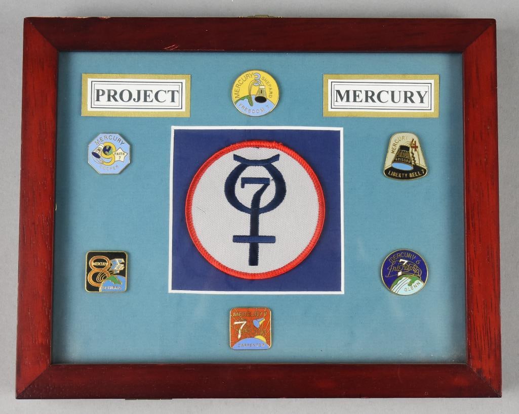 NASA Project Mercury Lapel Pin/Patch Shadowbox Display: NASA Project Mercury Lapel Pin/Patch Shadowbox Display. Contains six different lapel pins and an official Mercury Mission patch. Frame measures 8" x 10". Single owner collection inspired by the 1969 M