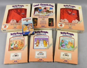 (7) 1985-87 Worlds of Wonder Teddy Ruxpin Tapes & Outfits
