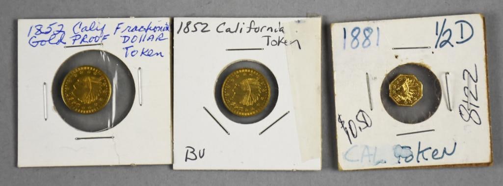 1852, 1881 California Gold Tokens - Extremely Fine: Lot is two 1852 California Gold dollar fraction tokens and one 1881 California half dollar.