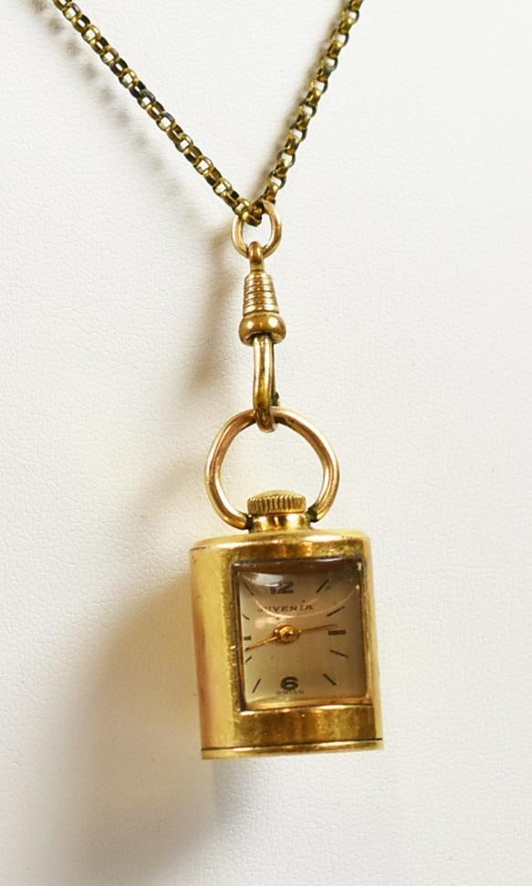 Vintage Juvenia Pendant Watch: This is a vintage Juvenia Swiss-made watch. Known for their unique and high-quality timepieces. This pendant comes on a vintage 1/20 12K gold filled pocket watch chain. Pendant is approx. 1 1/4" long,