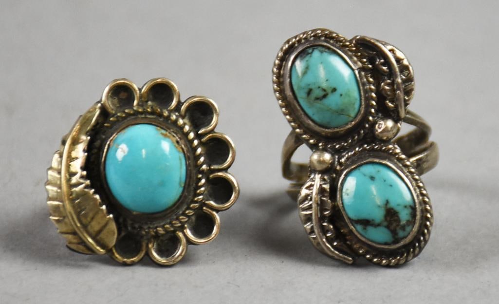Vintage Native American Sterling/Turquoise Rings: These pretty rings are Native American. Both are sterling with turquoise, one stone and two stone rings, each in a feather style setting. No visible marks, one size 7, one size 5 /12, overall approx w