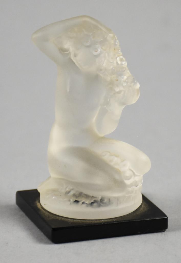 Lalique Floreal Frosted Crystal Lady Paperweight: Fantastic vintage Lalique frosted crystal paperweight. Figure of a nude woman with one hand in her hair. Nicely marked on bottom and measures approx. 2" x 2" x 3.5" tall.