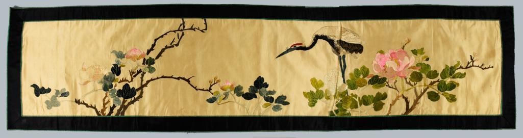 Vintage Chinese Embroidered Silk, Crane Panel: Gorgeous Chinese textile of embroidered silk. Appears hand crafted with a crane and trees with flowers. Black silk frame, stamped on back made in China. Measures approx. 16" x 67". From the estate of 