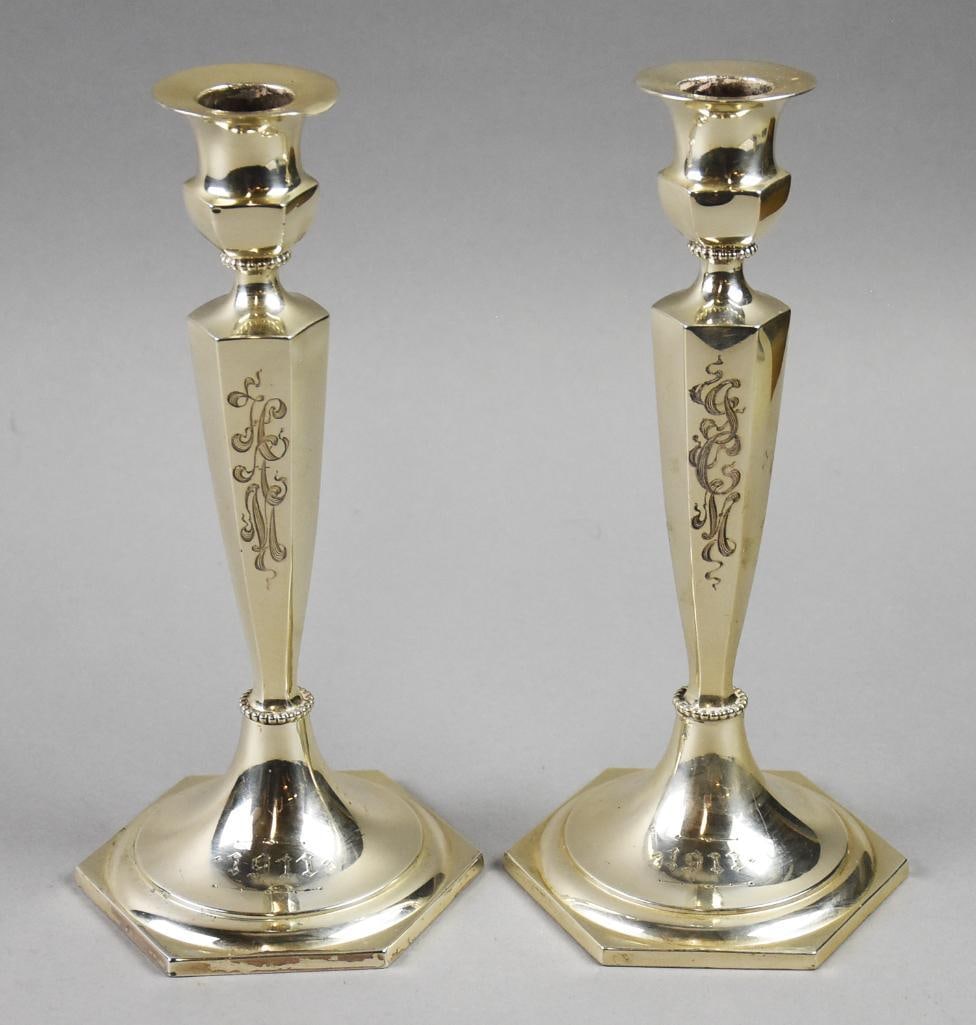 1911 Gorham Sterling Silver Monogrammed Candlesticks: Fantastic pair of sterling candlesticks from Gorham Manufacturing Co. They are simple but elegant with beading around base of the bowl and stem with optic panels. Each is monogrammed HAM and GCM. Each