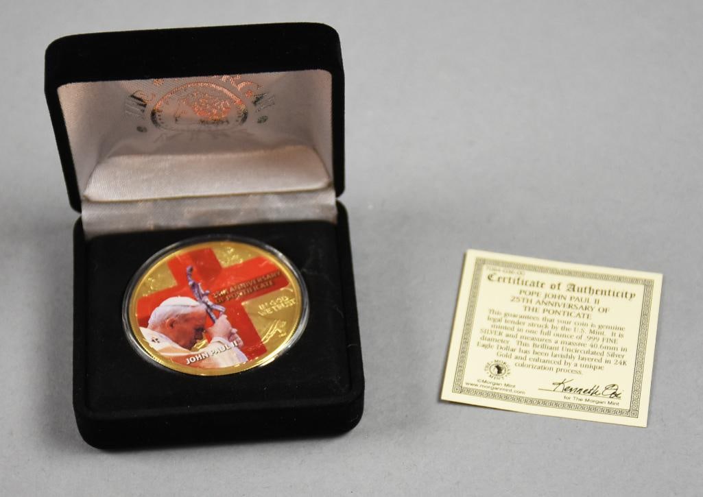Morgan Mint 1 oz .999 Silver 25th Anniversary- Pope John Paul Ponticate-COA: Morgan Mint 1 oz .999 Silver 25th Anniversary Ponticate. In original presentation box with COA. Pope John Paul.