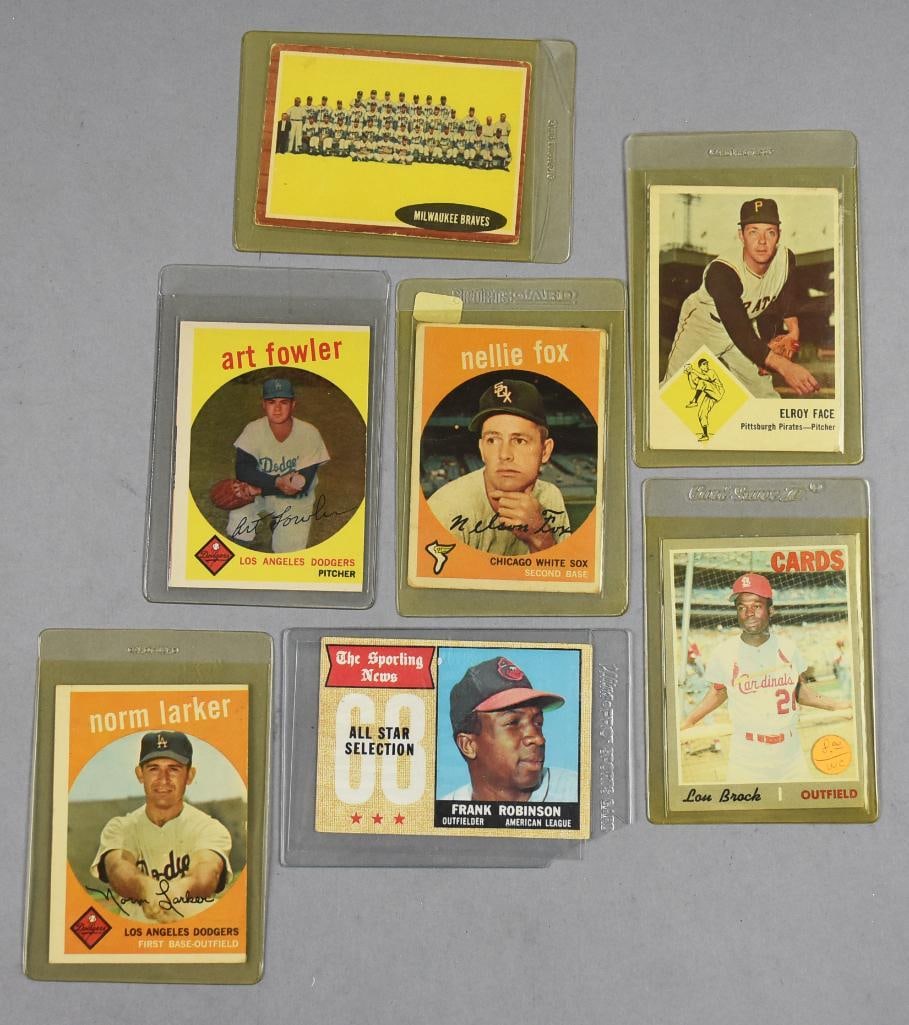1950s-70s Topps & Fleer Baseball Cards-Dodgers, Cards & More: Lot is seven 1950s-70s Topps & Fleer Baseball Cards-Dodgers, Cards & More. Includes: 1959 Nelly Fox, 1959 Art Fowler, 1961 Milwaukee Braves team, 1963 Elroy Face, 1959 Norm Larker, 1968 Frank Robinson