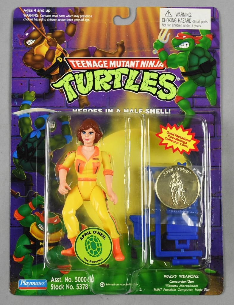 1994 Playmates TMNT April O'Neil w/ Coin 97 Back-MOC-NOS: 1994 Playmates Teenage Mutant Ninja Turtles April O'Neil w/ Coin-MOC-NOS. Single owner collection from the largest toy collector on the West Coast.