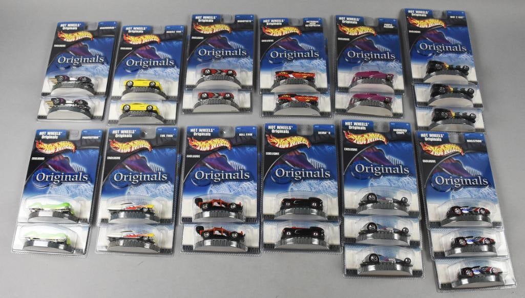 (27) 2001 Mattel Hot Wheels Originals Die Cast-MOC-NOS: Lot is 27 2001 Mattel Hot Wheels Originals Die Cast-MOC-NOS. Includes two each: Phantastique, Arachnorod, Muscle Tone, Monoposto, Metrorail Nash Metropolitan, Evil Twin, Roll Cage, Purple Passion, Deo
