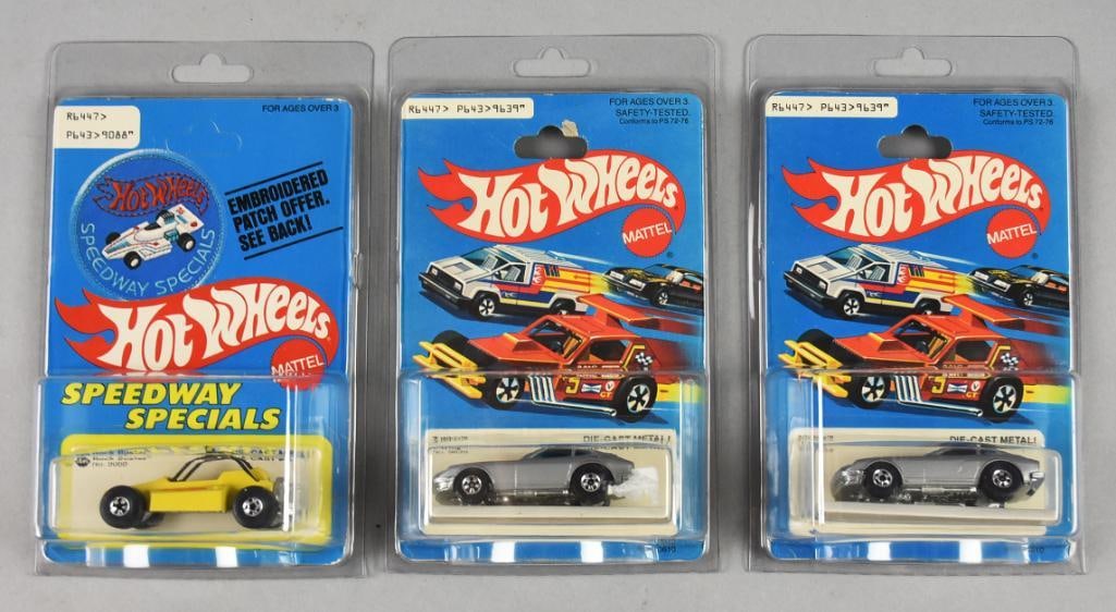 (3) 1977, 79 Mattel Hot Wheels Rock Die Cast-Unpunched-NOS: 1977, 79 Mattel Hot Wheels Rock Die Cast-Unpunched-NOS. Includes an unpunched Rock Buster and two punched Z-Whiz. Single owner collection from the largest toy collector on the West Coast.