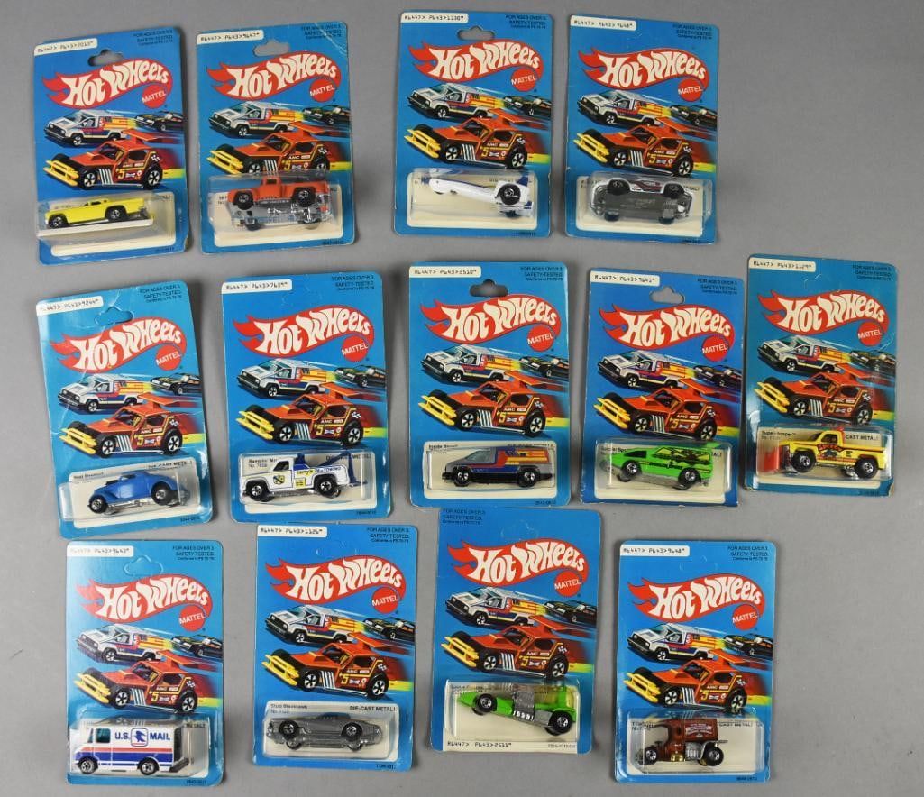 (13) 1981 Mattel Hot Wheels Die Cast-Unpunched-MOC-NOS: Lot is 13 1981 Mattel Hot Wheels Die Cast-Unpunched-MOC-NOS. Includes '57 T-Bird, Letter Getter, Hi-Tail Hauler, Neet Streeter, P 911 Turbo, Super Scraper, Stutz Blackhawk, Ramblin' Wrecker, Inside St