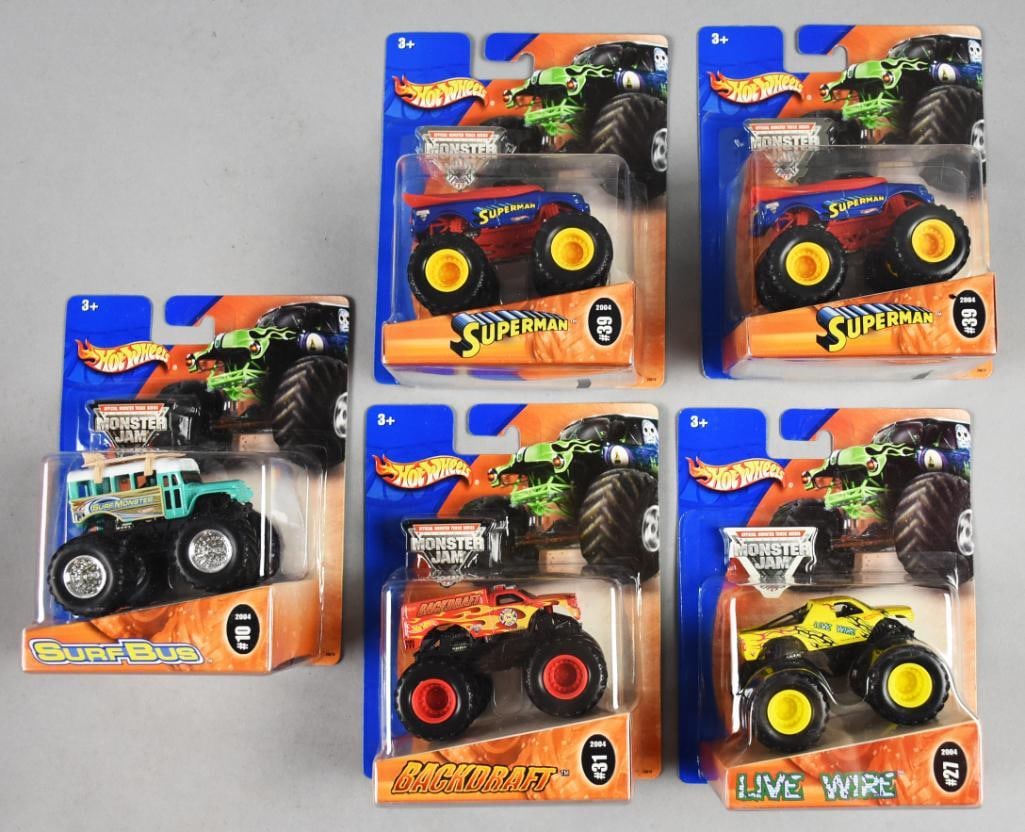 (5) 2004 Mattel Hot Wheels Monster Jam Die Cast-MOC-NOS: Lot is five 2004 Mattel Hot Wheels Monster Jam Die Cast-MOC-NOS. Includes Surf Bus, Backdraft, Live Wire and two Superman. Single owner collection from the largest toy collector on the West Coast.