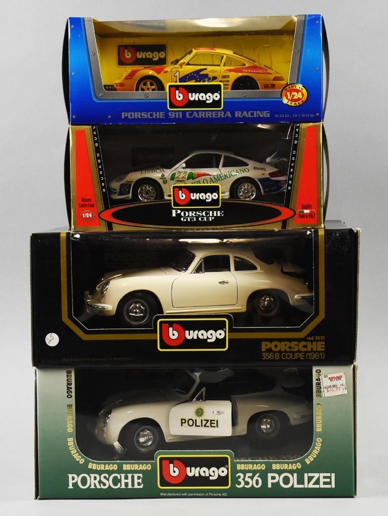 (4) Burago Porsche Variants, 1:24 Scale-MIB-NOS: Lot is four Burago Porsche Variants, 1:24 Scale-MIB-NOS. Includes a 1961 Coupe, 1964 356 Polizei, 911 Carerra Racing and GT3 Cup. Single owner collection from the largest toy collector on the West Coa