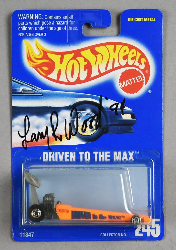 1991 Hot Wheels Larry Wood Signed Driven to the Max- Mattel Hot Wheels MOC: 1991 Mattel Hot Wheels Larry Wood Signed, dated 1994, Driven to the Max-MOC. Single owner collection from the largest toy collector on the West Coast.