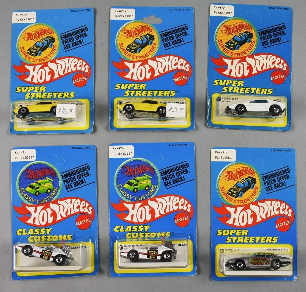 (6) 1977 Mattel Hot Wheels Die Cast Cars-Unpunched-NOS: Lot is six 1977 Mattel Hot Wheels Die Cast Cars-Unpunched-NOS. Includes one each: Jaguar XJS and Royal Flash, two each: Science Friction and Upfront 924 with one card punched. All other cards unpunche