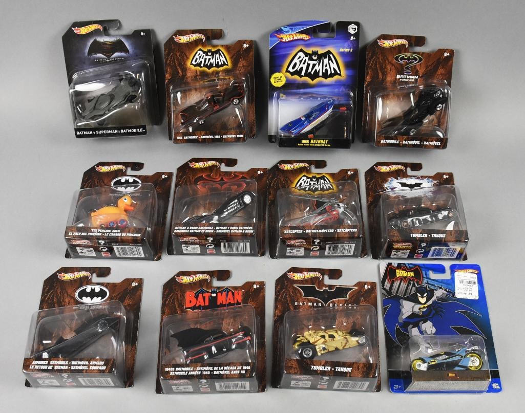 (12) 2000s Mattel Hot Wheels Batman Die-Cast-MOC-NOS: Lot is 12 2000s Mattel Hot Wheels Batman Die-Cast-MOC-NOS. Includes Batmobiles, Bat-Copter, Penguin Duck and more. No duplicates. Single owner collection from the largest toy collector on the West Coa