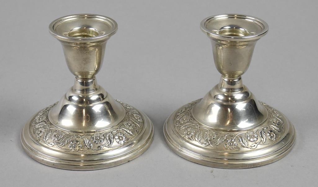 Vintage Wm. Rogers Sterling Springtime Candle Holders: Beautiful pair of sterling candle holders by William Rogers. Each has a weighted reinforced base with a vine and flower detail. Well marked on bottom, both 3.5" tall x 4" wide with an overall approx w