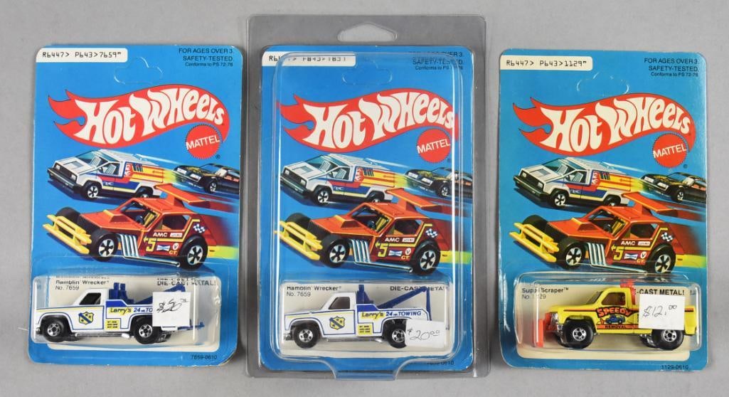 (3) 1979 Mattel Hot Wheels Die-Cast-Unpunched-MOC - NOS: Lot is three 1979 Mattel Hot Wheels Die-Cast-Unpunched-MOC - NOS. Includes one Super Scraper and two Ramblin' Wrecker. Single owner collection from the largest toy collector on the West Coast.