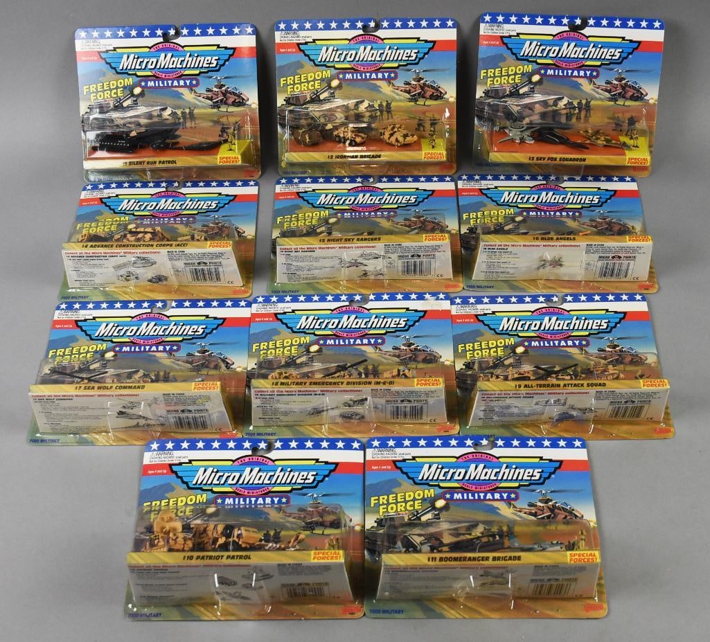 (11) 1994 Galoob Micro Machines Freedom Force-MIB-NOS: Lot is 11 1994 Galoob Micro Machines Freedom Force-MIB-NOS. Includes Silent Run Patrol, Ironman Brigade, Night Sky Rangers, Advance Construction Corps, Sky Fox Squadron, Seawolf Command, Blue Angels, 