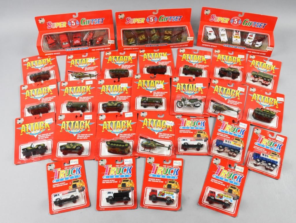 (28) Road Tough Tanks, Trucks & Multi Packs-MIP-NOS: Lot is 28 Road Tough Tanks, Trucks & Multi Packs-MIP-NOS. Includes Ice Cream, Oil Tanker, Tow, several Military vehicles and five car Super Gift sets. Single owner collection from the largest toy