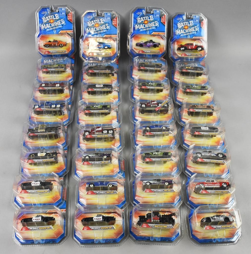 (32) 2009 Jada Battle Machine Assortment-MOC-NOS: Lot is 32 2009 Jada Battle Machine Assortment-MOC-NOS. Includes Chevy Camaro, Bel Air, Ford Mustang and more. Lot with duplicates. Single owner collection from the largest toy collector on the West Co