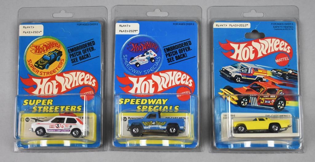 (3) 1977, 79 Mattel Hot Wheels Die Cast-Unpunched-NOS: Lot is three 1977, 79 Mattel Hot Wheels Die Cast-Unpunched-NOS. Includes two unpunched 1977 Hare Splitter and Bywayman and a 1979 '57 T-Bird, punched card. Single owner collection from the largest toy