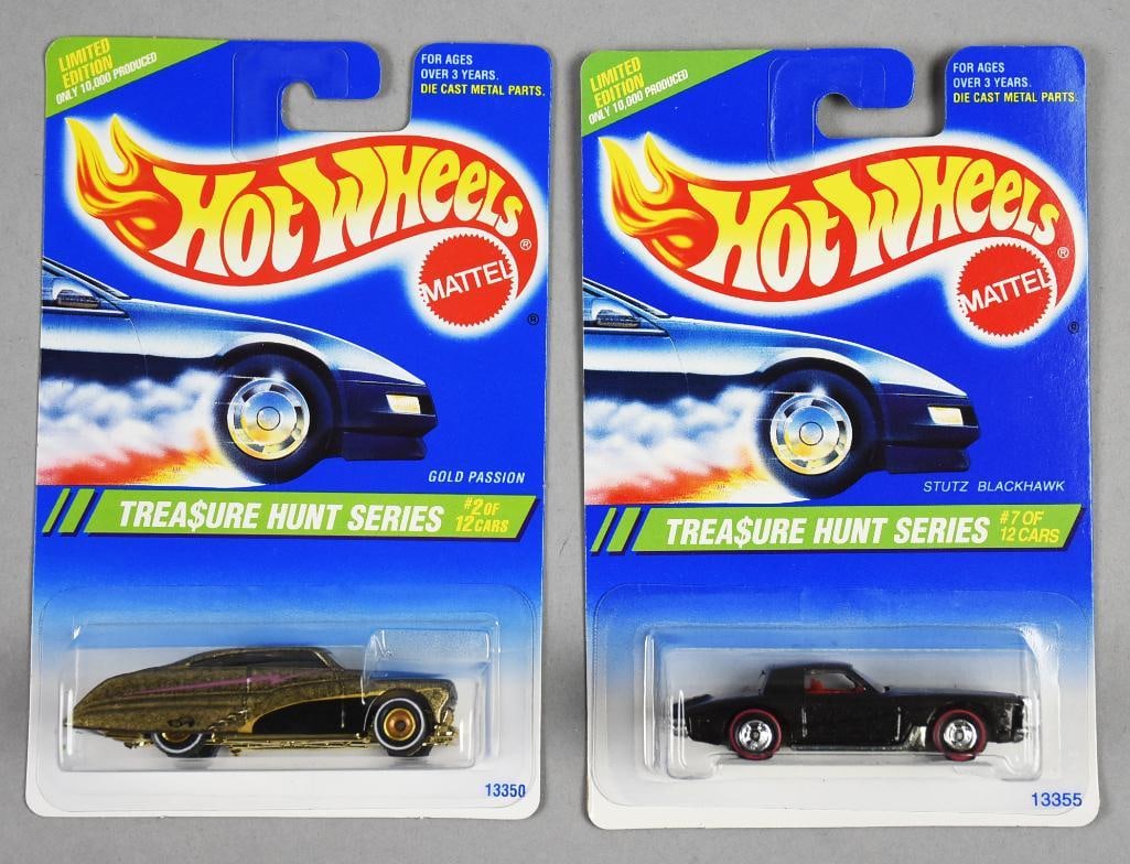 (2) 1994 Mattel Hot Wheels Treasure Hunt-MOC-NOS: Lot is a pair of 1994 Mattel Hot Wheels Treasure Hunt-MOC-NOS. Includes Stutz Blackhawk and Purple Passion. Single owner collection from the largest toy collector on the West Coast.