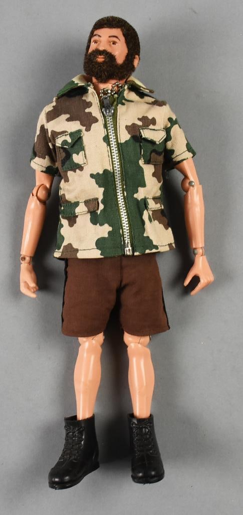 c1975 Hasbro GI Joe Fuzzhead-Talking Adventure Team: This GI Joe Fuzzhead appears to be from the mid 1970s. He is from the Adventure Team line wearing khaki shorts and short sleeve camouflage shirt. Has pull chain in chest.