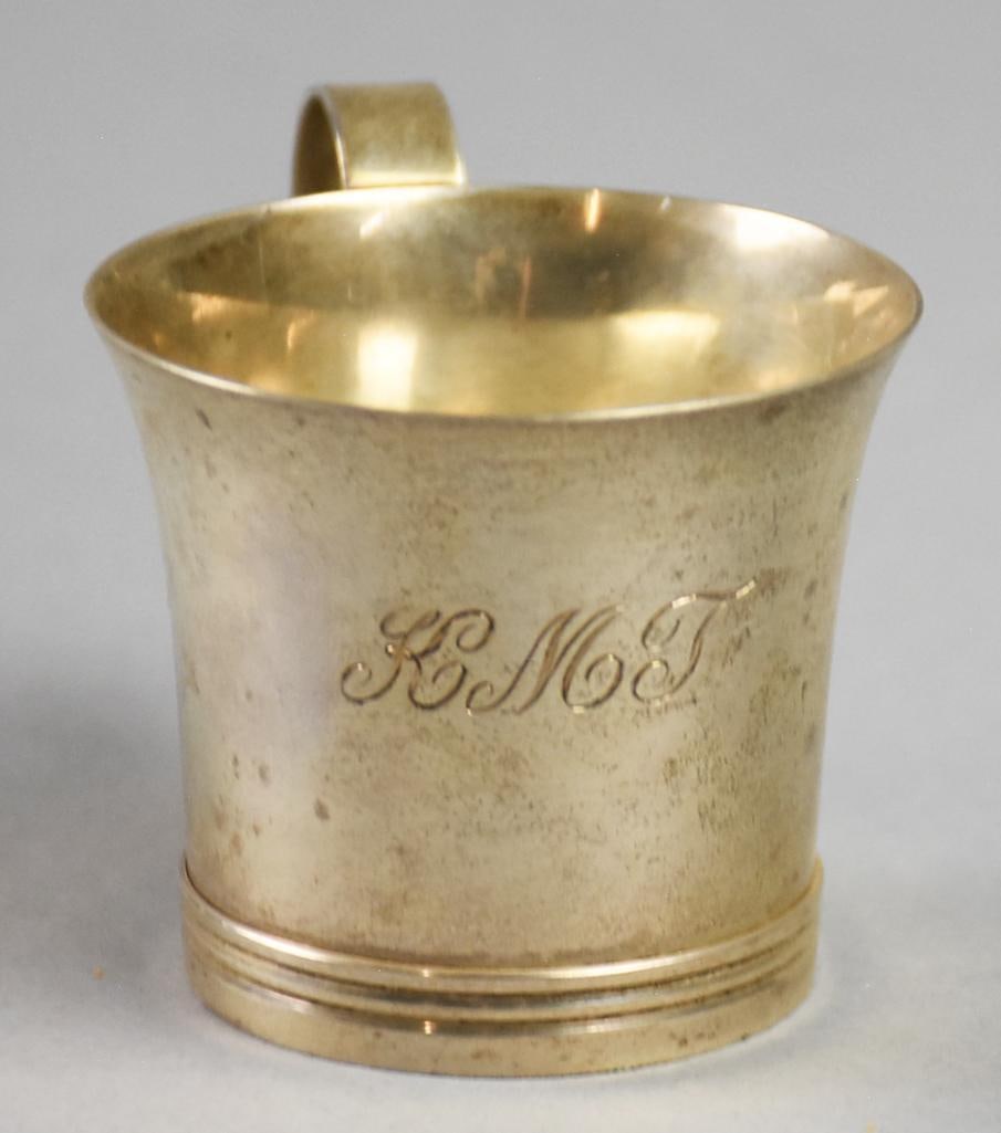 Vintage Tiffany & Co Sterling Paul Revere Child's Cup: Very cute Paul Revere Reproduction cup from Tiffany & Co. Due to size, appears to be a child's cup. Simple in style with flared rim and banded base. Monogrammed KMT and measures approx. 2" x 2", appro