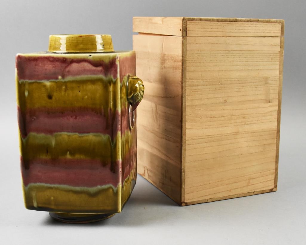 Vintage Japanese Porcelain Drip Vase, Elephant Handles: This is a stunning vintage Japanese vase, appears porcelain. Drip glaze is bands of pink and olive green. Molded elephant head handles. No visible marks and comes in the original bamboo box. Measures 