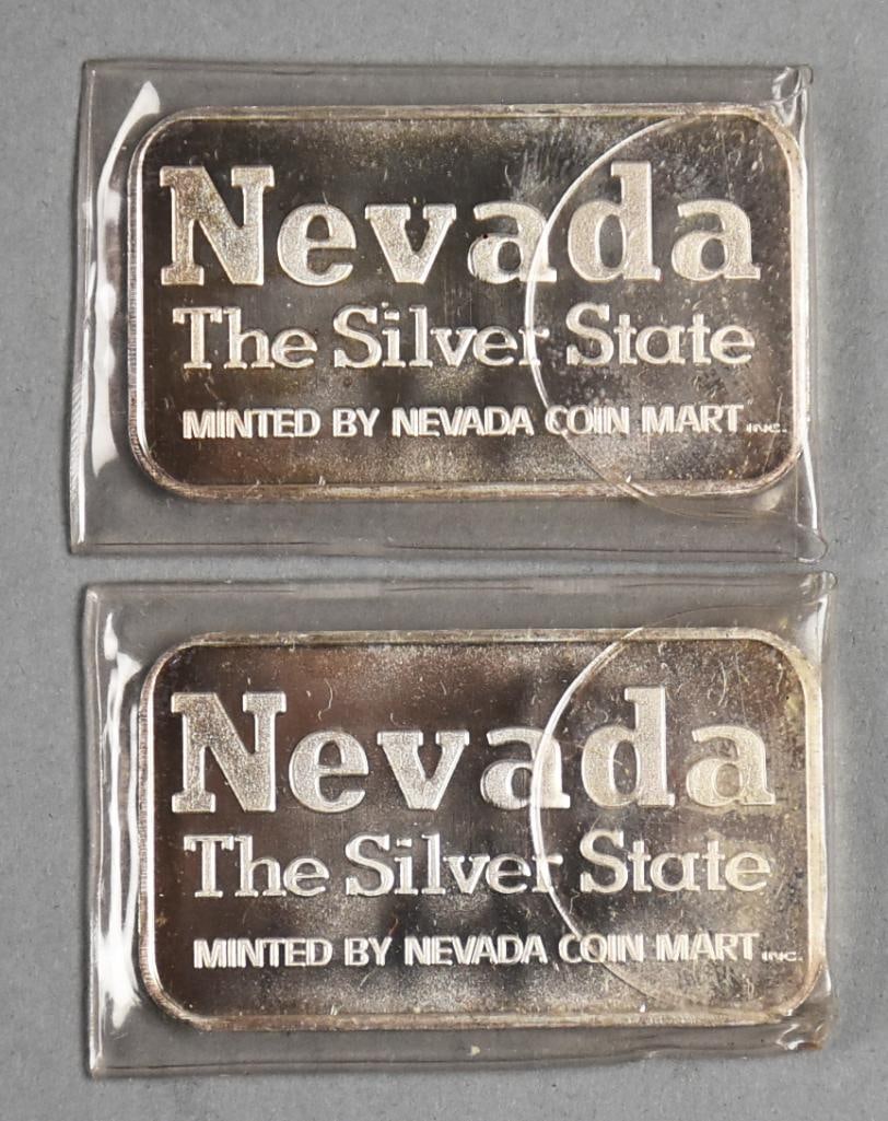 (2) 1 Troy Oz Silver Nevada Ingots - Nevada Coin Mart: Lot is a Pair 999 Silver Nevada Ingots - Nevada Coin Mart, Inc. Each are one troy ounce.