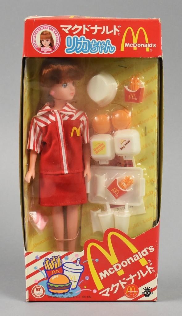 1984 Takara Japan McDonald's Rica-Chan Crew Member Doll-NRFB-NOS: Lot is a 1984 Takara Japanese McDonald's Rica-Chan Crew Member Doll-NRFB-NOS. She is complete with an order for two. Japanese edition. Amazing piece.