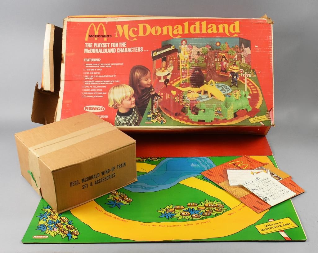 1976 Remco McDonalds McDonaldland Playset: This great find is a 1976 Remco McDonald's playset. McDonaldland is a train set with playland surface and backdrop. The box with all the accessories has never been opened, the rest that can be seen ap