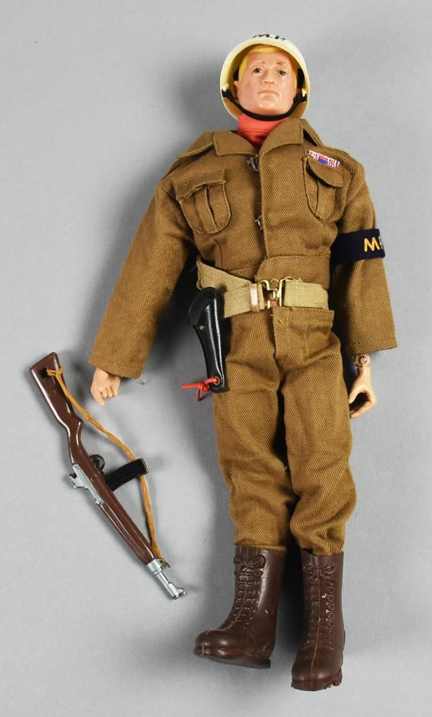 1964-65 Hasbro GI Joe w/ Scar Airborne Military Police: Cool vintage Hasbro GI Joe as an Airborne Military Police. Blond hair with scar. He has his full uniform, belt and holster. Rifle appears to be extra. Mark on tush was used from 1964-65. Single owner
