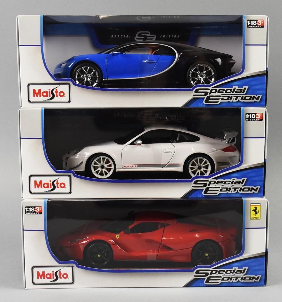 (3) 2016 Maisto 1:18 Die-Cast Sportscars - MIB-NOS: Lot is three 2016 Maisto 1:18 Die-Cast Sportscars - MIB-NOS. Includes Bugatti Chiron, Porsche 911 GT3 RS 4.0 and La Ferrari. Single owner collection from the largest toy collector on the West Coast.