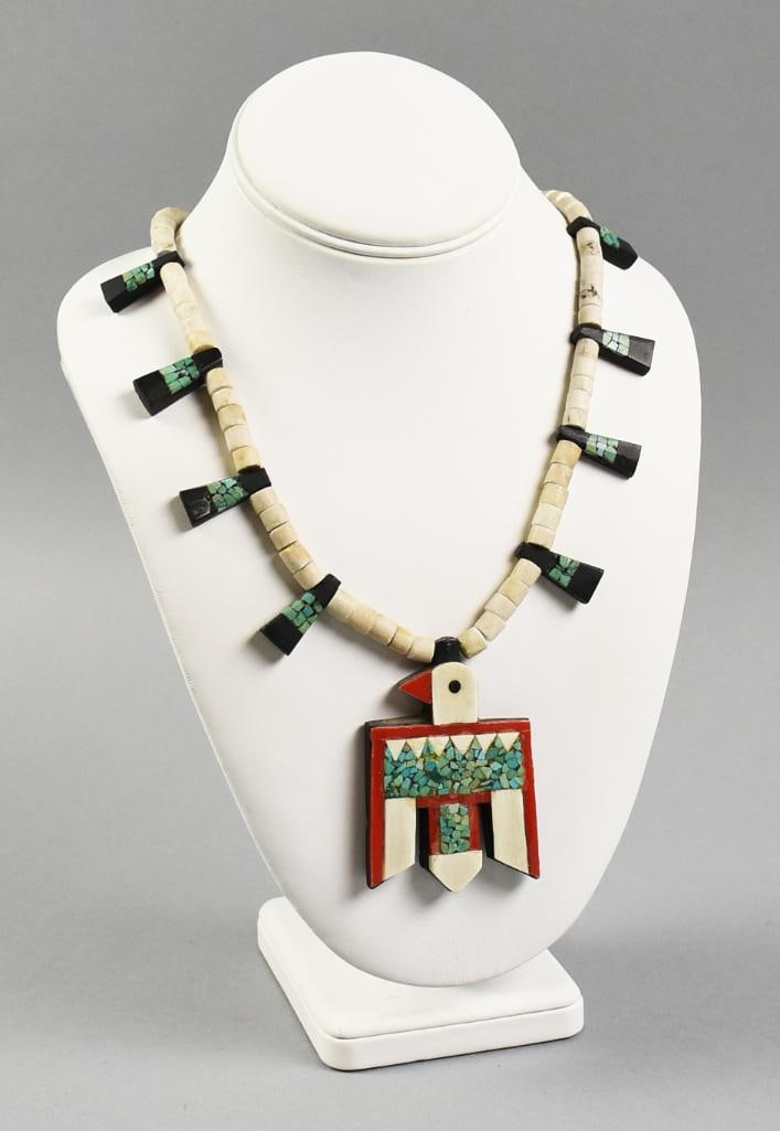 Vintage Santo Domingo Thunderbird Necklace: These fantastic necklaces are made from many repurposed items from batteries to records. This piece is Santo Domingo Thunderbird with turquoise chips with what appears to be coral and bone. No visible