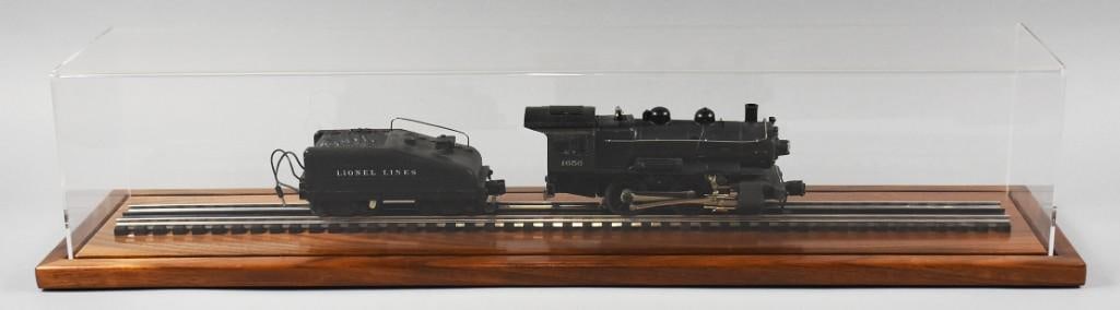 Post War Lionel Lines O Gauge 1656 Switcher-6043B-Tender: Lionel Lines O Gauge 1656 Switcher with 6043B Tender Produced in the post-war era, this is a classic switcher locomotive. Features a 0-4-0 wheel configuration, commonly used for industrial and y