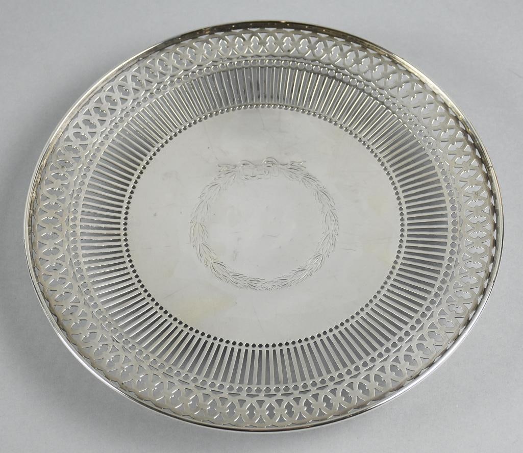 Vintage Black Starr & Frost Sterling Reticulated Salver 340 grams: This lovely salver is from Black Starr & Frost. It has an ornately pierced rim. The center has a delicate wreath with ribbon. Measures 11" wide with an approx weight of 34grams