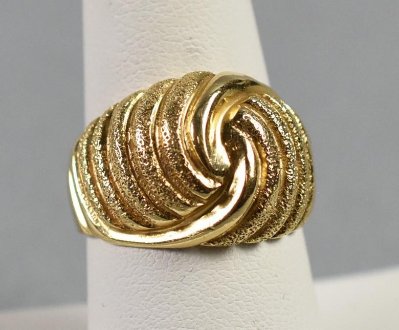 Vintage 14 K Yellow Gold Stylized Knot Ring, Signed: Great looking 14 K yellow gold ring with a stylized knot. Ring is signed, unknown maker, looks like ST something. Size is and 8 and overall approx weight of 8.8 grams.