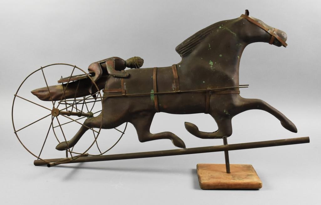 Antique Copper & Brass Horse and Sulky Rider Weather Vane: Very cool antique weather vane. This running horse has a two wheeled sulky with rider. It is mostly copper with the horse tack appearing to have some brass accents. It has been mounted to a wooden bas