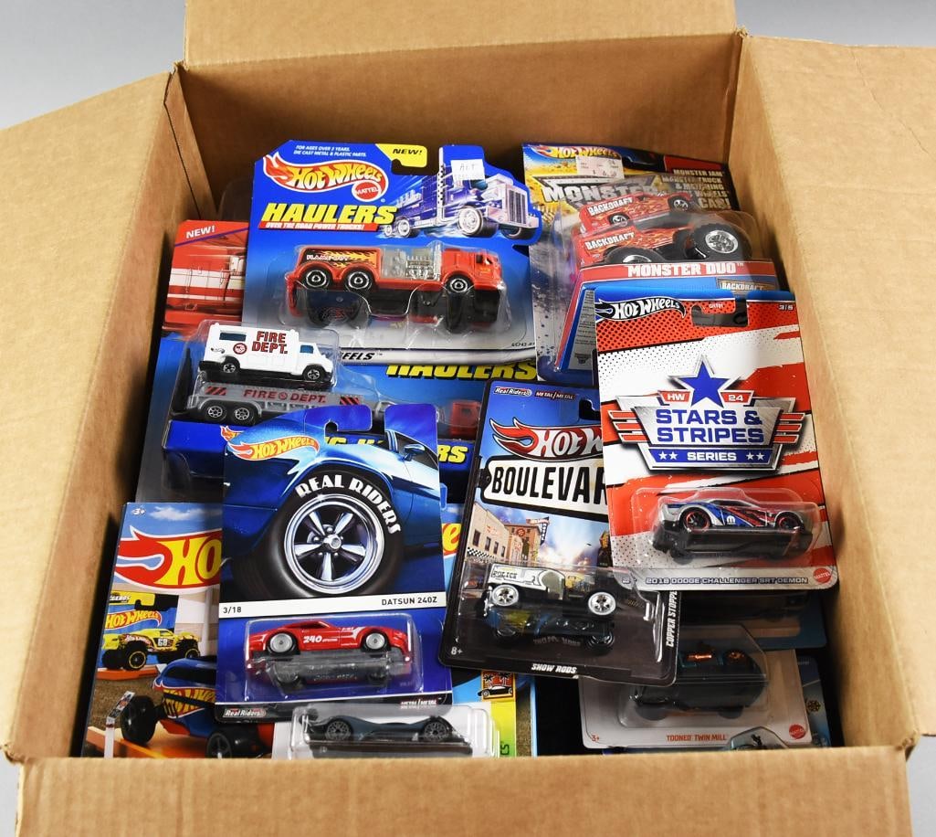 (70) 1990s-00s Mattel Hot Wheels Die-Cast Assortment-MOC-NOS: Title: 70 1990s-00s Mattel Hot Wheels Die-Cast Assortment Description: This auction is for a large assortment of 70 Mattel Hot Wheels die-cast vehicles, spanning from the 1990s to the 2000s. Condition