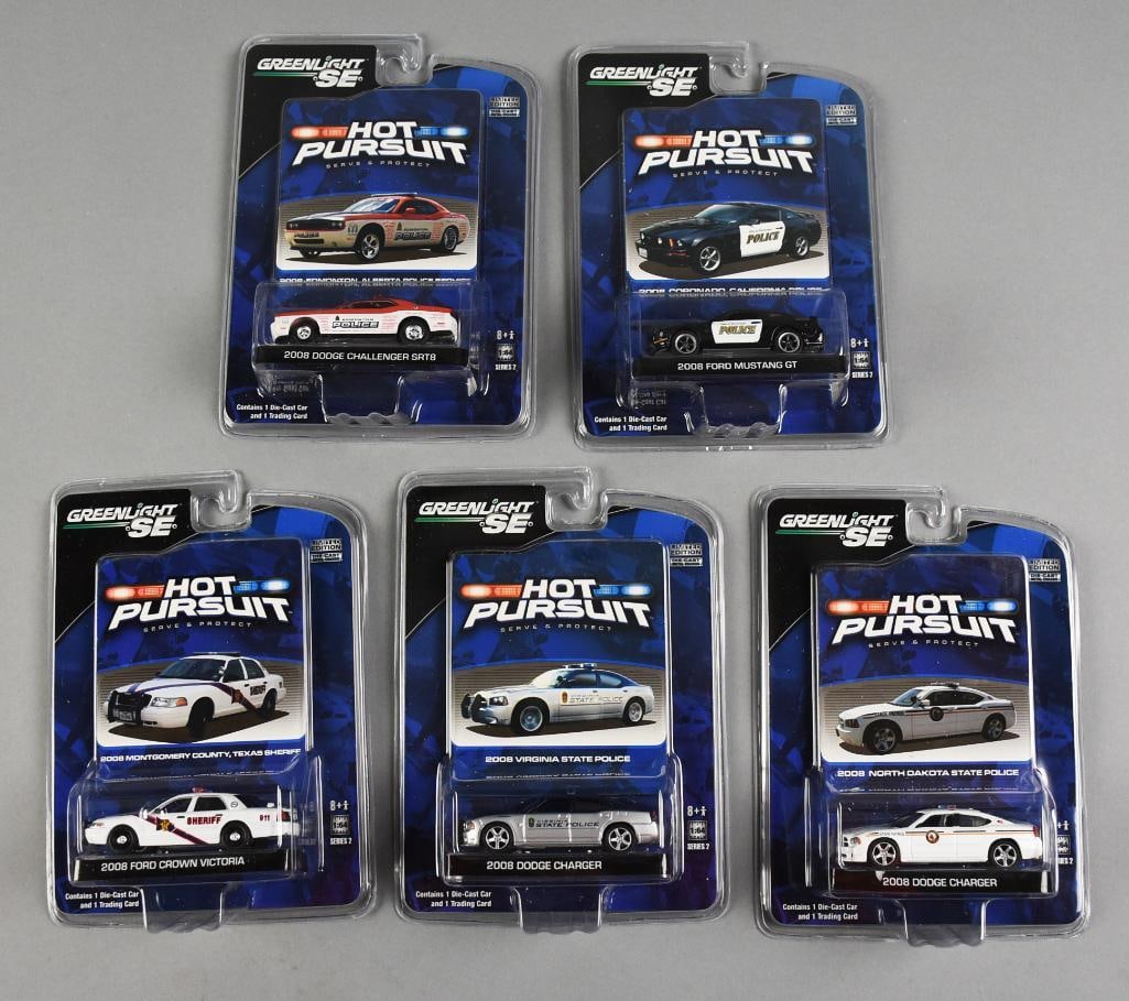 (5) 2009 Greenlight SE State Hot Pursuit Die-Cast-MOC-NOS: Lot is five 2009 Greenlight SE State Hot Pursuit Die-Cast-MOC-NOS. Includes 2008 Dodge Challengers SRT8-Alberta Canada, 2008 Ford Mustang GT-Coronado, CA, 2008 Ford Crown Victoria-Montgomery County, T