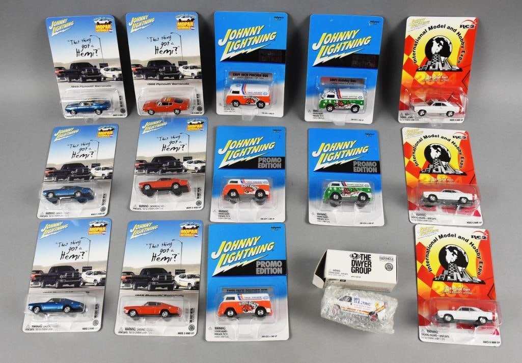(15) 2000s Johnny Lightning Die-Cast Promos & More-MOC-NOS: Lot is 15 2000s Johnny Lightning Die-Cast Promos & More-MOC-NOS. Includes 1969 Dodge Dart, one red, one blue 1968 Plymouth Baracuda, EMPI Holiday Bus, EMPI Inch Pincher Bus and Mr. Electric van. Lot w