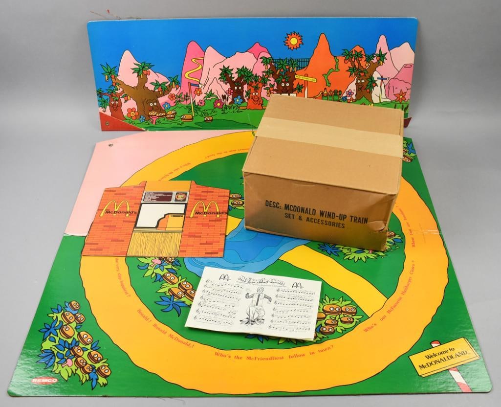 1976 Remco McDonalds McDonaldland Playset: This great find is a 1976 Remco McDonald's playset. McDonaldland is a train set with playland surface and backdrop. The box with all the accessories has never been opened, the rest that can be seen ap