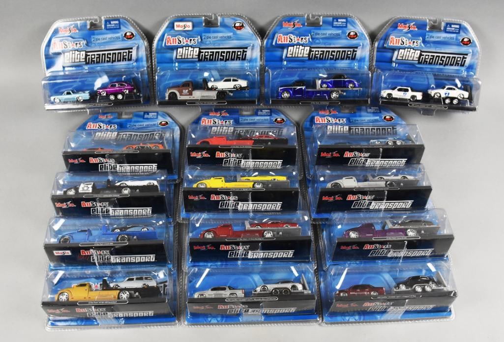 (16) 2000s All-Stars Elite Transport Maisto Die-Cast-MOC-NOS: Lot is 16 2000s Maisto All-Stars Elite Transport Die-Cast-MOC-NOS. Assorted car haulers with cars. Single owner collection from the largest toy collector on the West Coast.